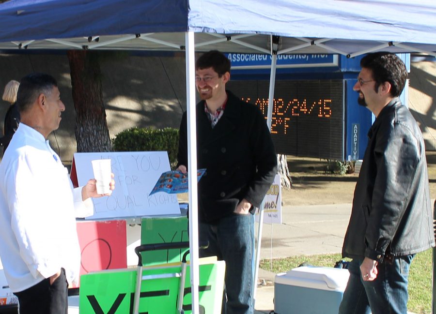 Timothy and Josh Brahm dialogue with one of the CSU Bakersfield staff about abortion.