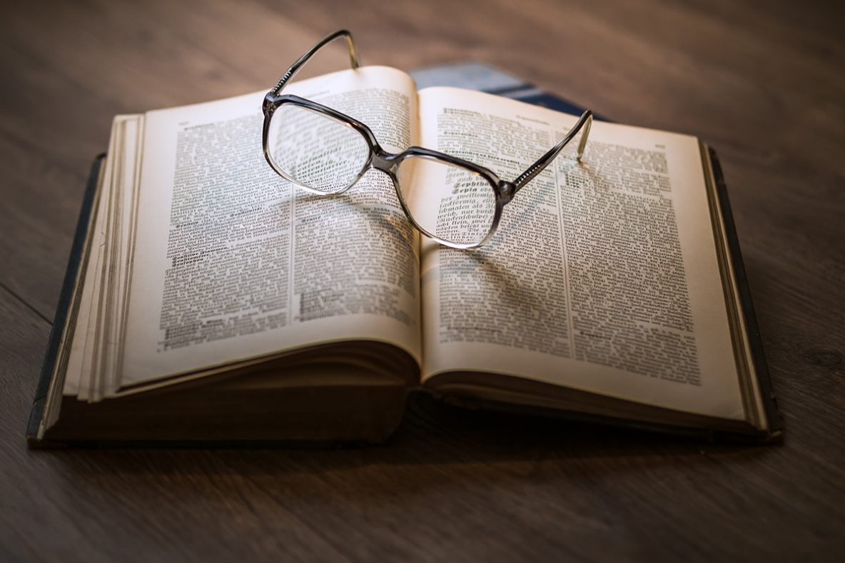 Book with glasses.