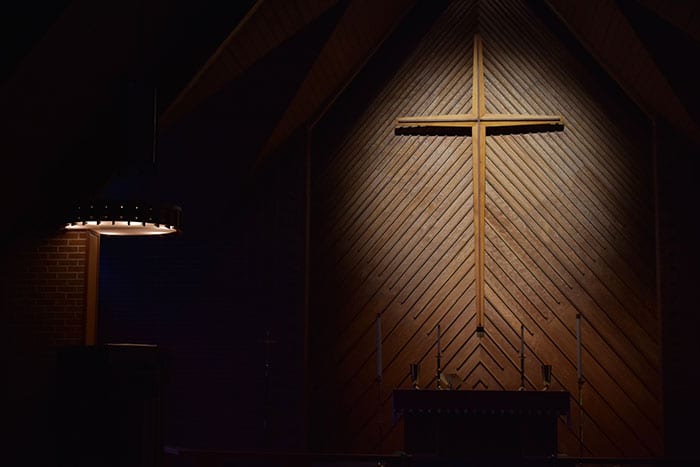 Cross on wall in church